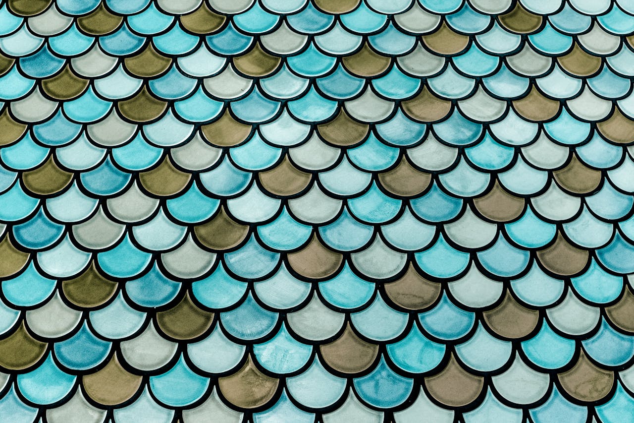 Eye-catching abstract scale pattern with blue hues, perfect for backgrounds and design projects.